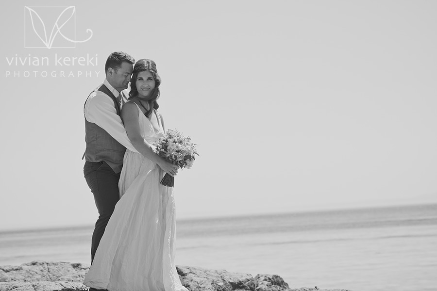 bride groom hug ocean shore portrait victoria bc